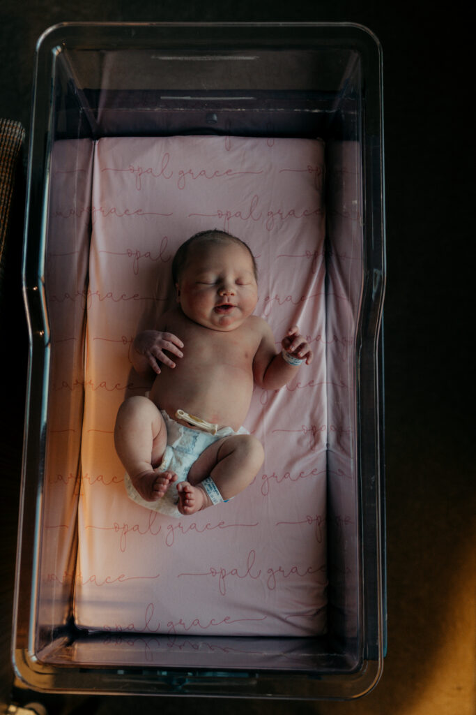 Newborn baby details captured during a hospital Fresh 48 session with Poppy + Blue Photography.